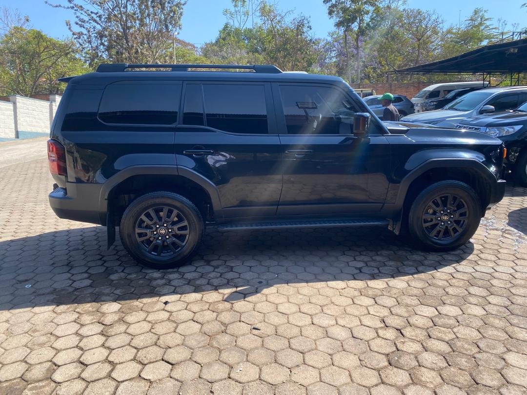 Toyota Land Cruiser 250 side view luxury car rental Kigali
