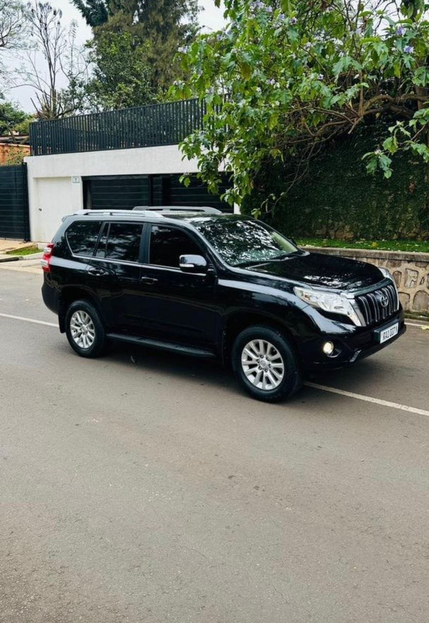 Toyota Prado TX luxury rental car on Kigali street